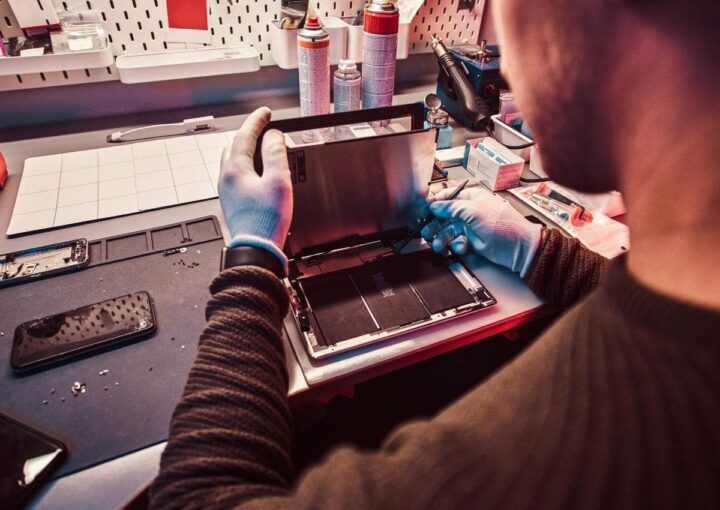 A man working on a laptop at a desk