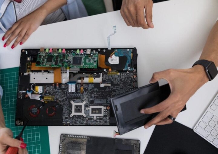 A team collaborating on a laptop